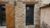 Photo réalisation Pose d&rsquo;une porte d&rsquo;entrée en PVC gris foncé, avec vitrages dépolis, à Orliénas